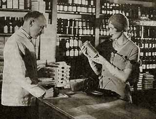 Shop owner closing a sale and earning revenues. Revenues are earned when Goods are delivered to the customer.